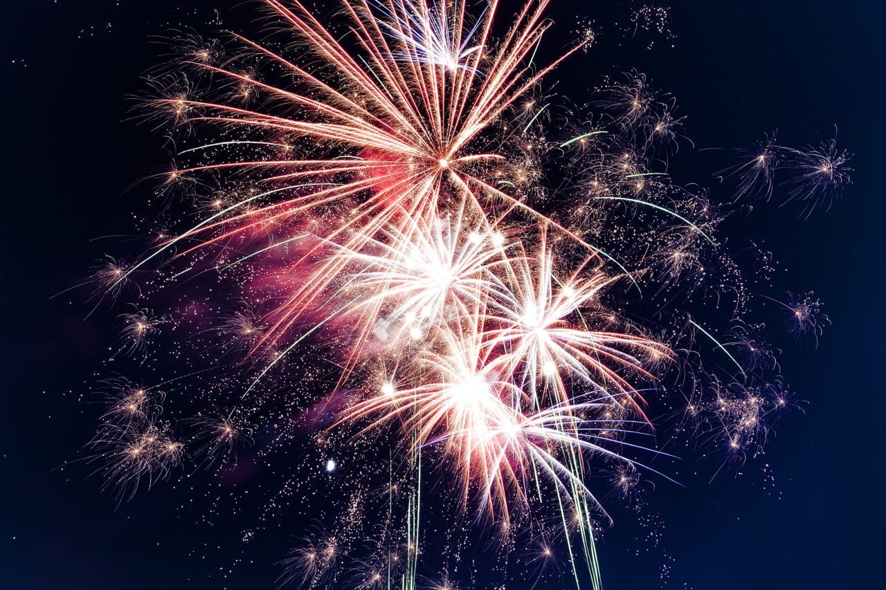 Close-up of fireworks in the night sky.